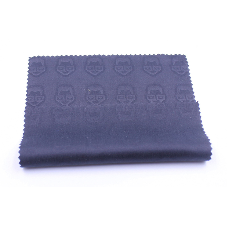 Tissu en relief de microfibre de logo pour des vêtements faits sur commande de monocle en verre